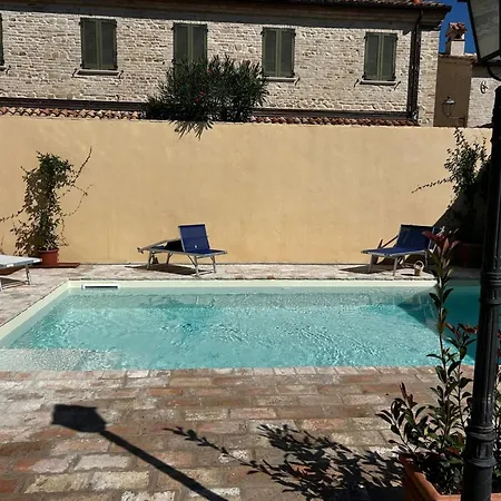 House In A Village With Swimming Pool Пезаро